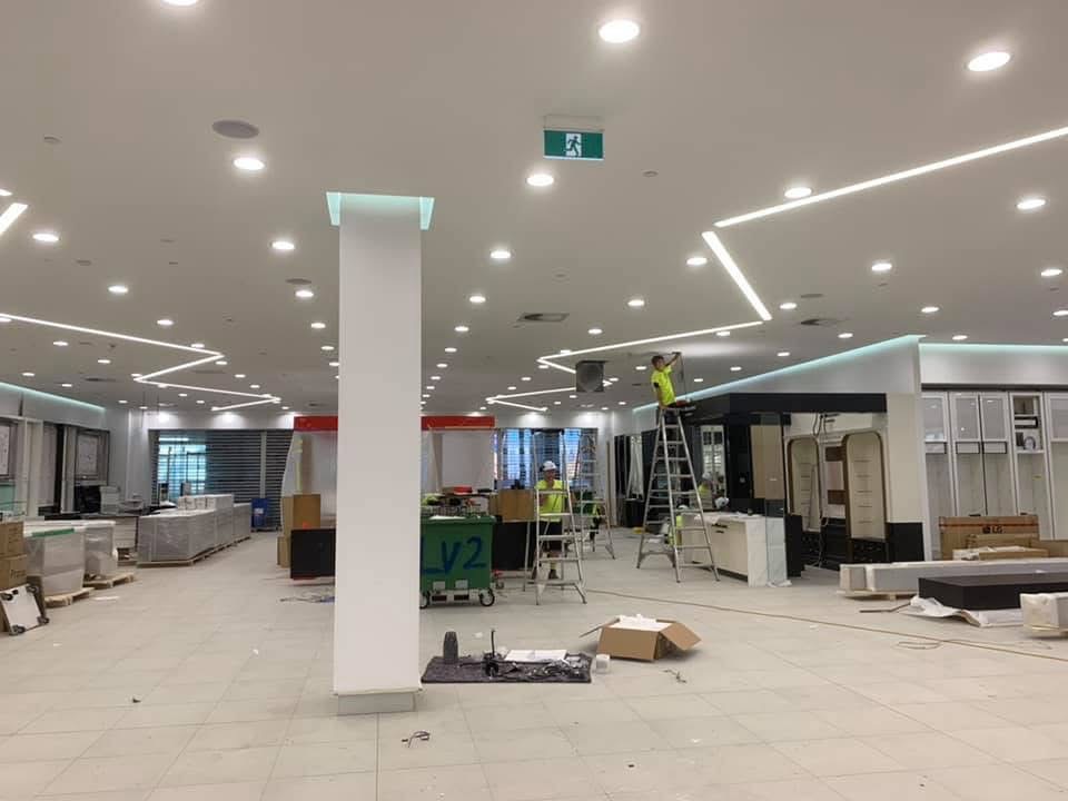 Commercial interior — painter on site