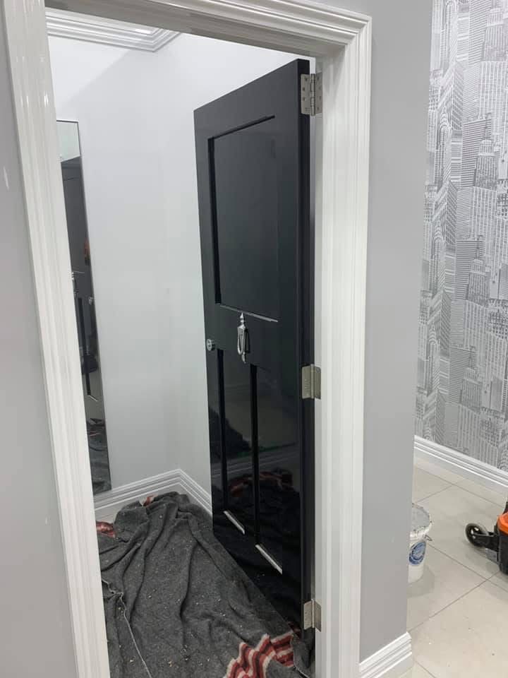 Interior painting — black door white trim
