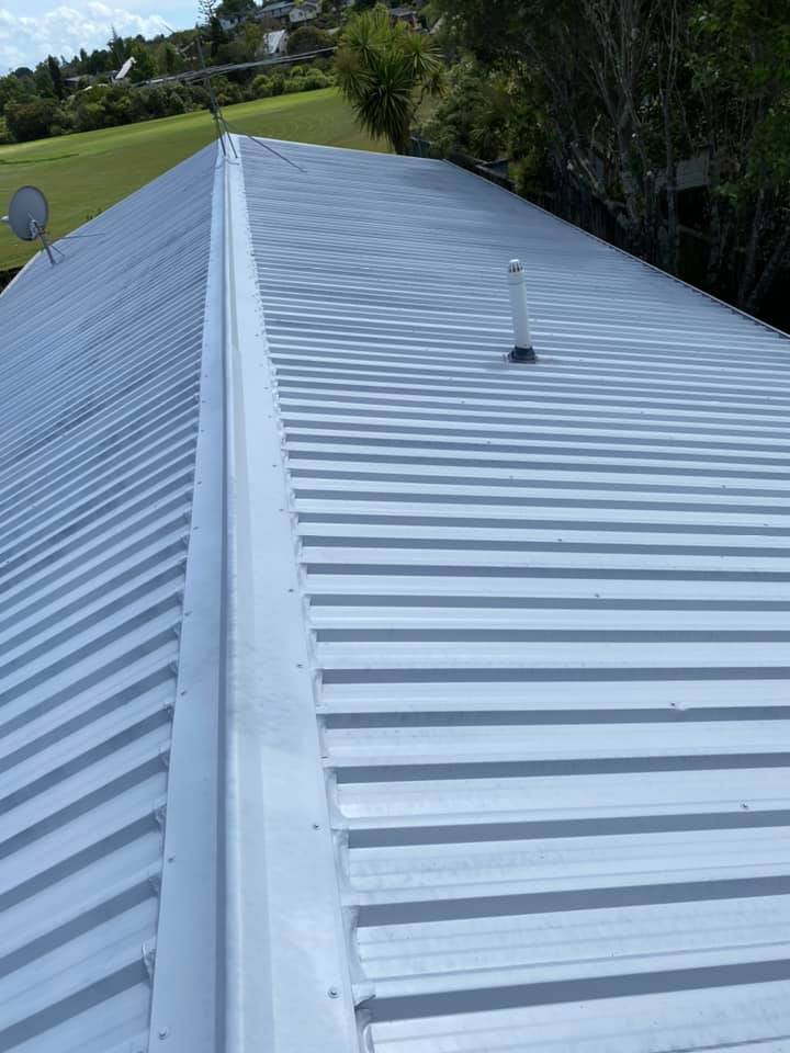 Roof painting — white iron roof